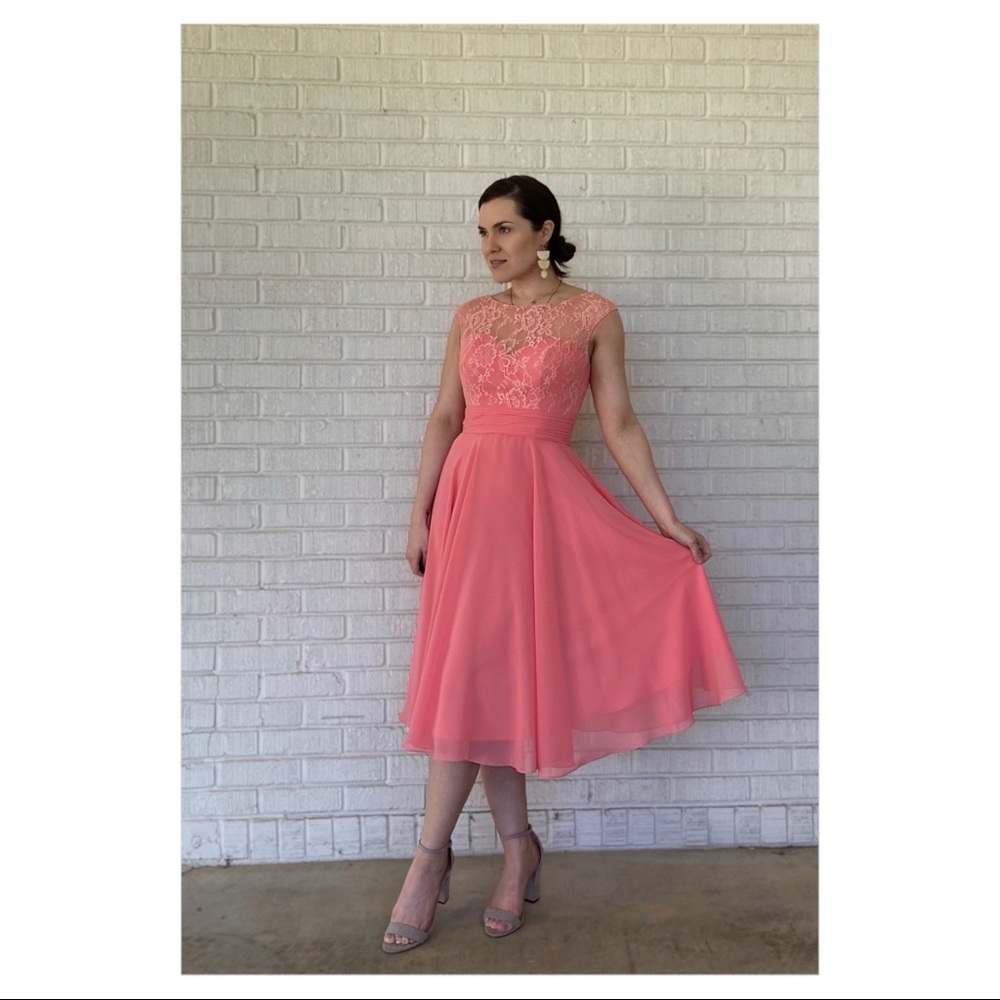 Womans Kanali K size 2 midi dress.Originally $180 (Has Built In Bra) Color Melon